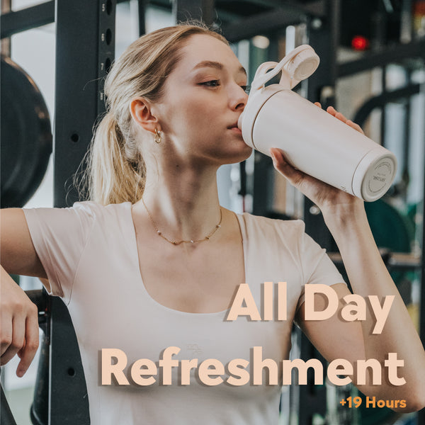 Woman drinking from SIPLUSH Malibu Sands 24oz Stainless Steel Shaker Bottle at gym – All Day Refreshment over 19 hours cold lifestyle shot